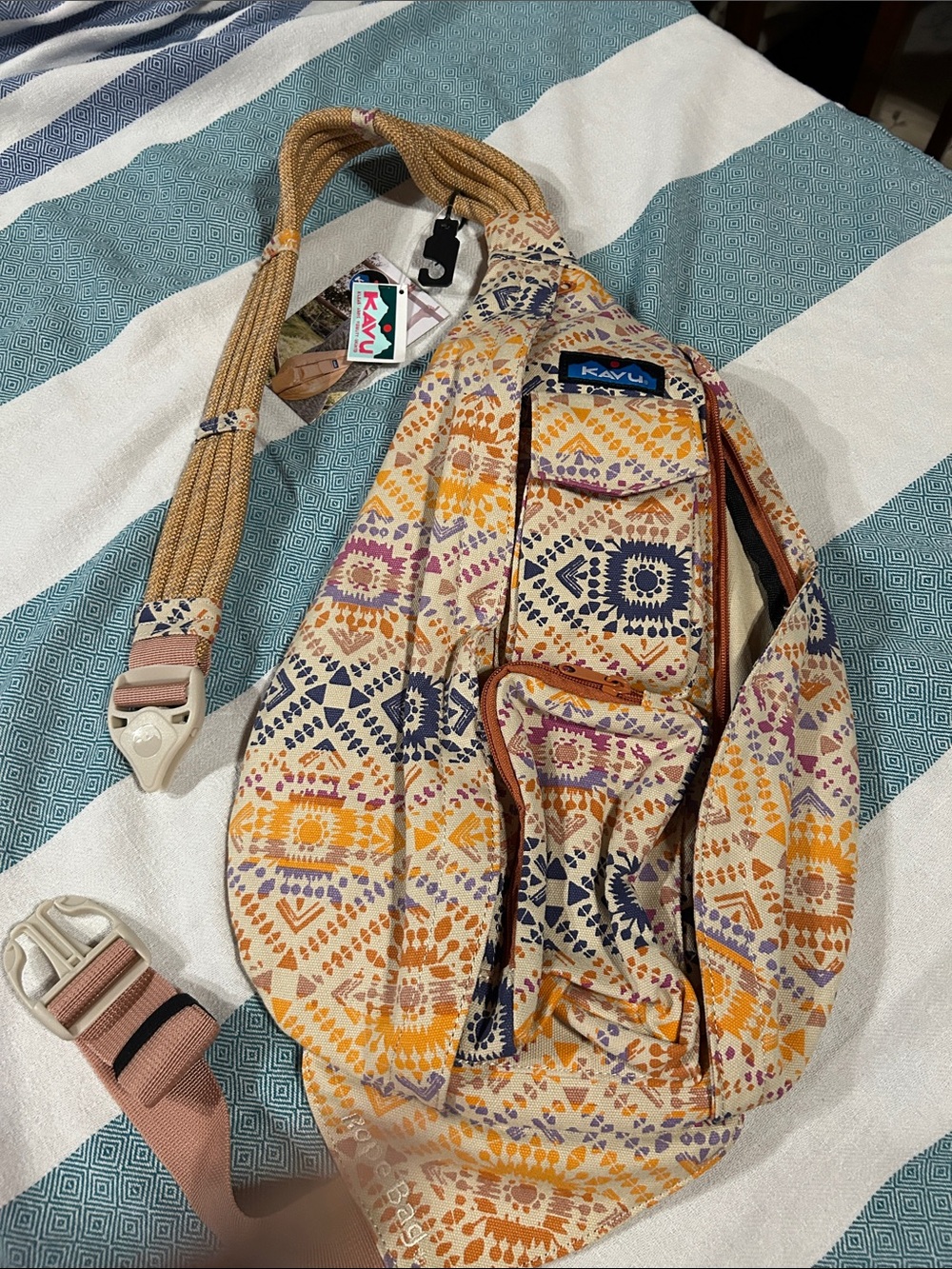 Kavu Cream Multi-Color Patterned Sling Bag with Navy & Mustard Accents